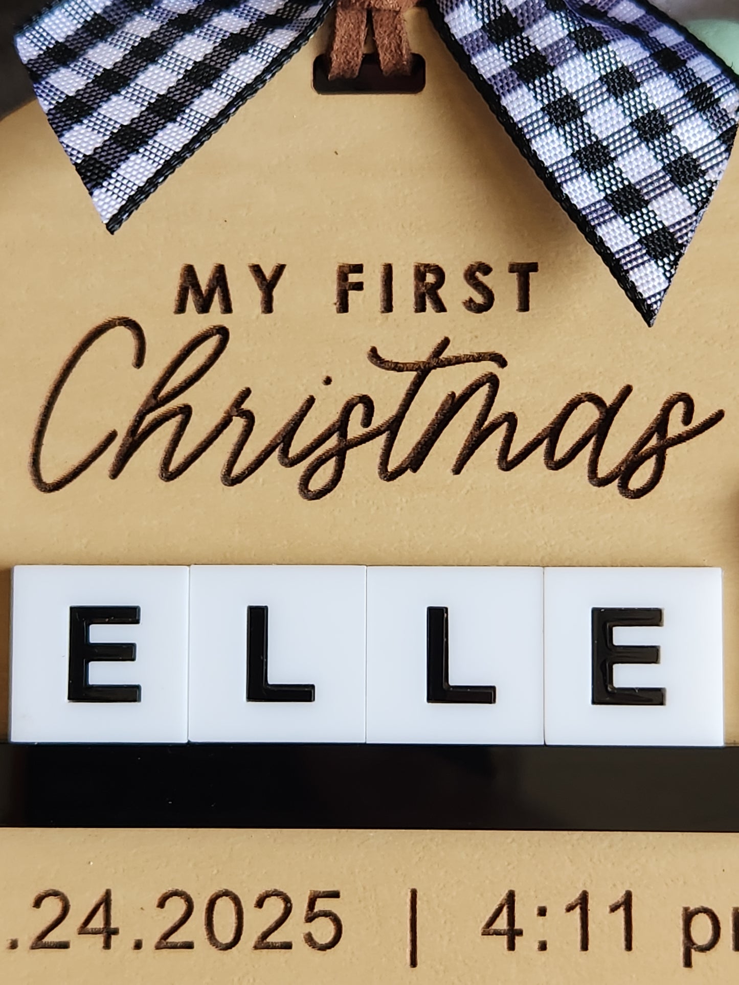 Personalized 'My First Christmas' sign with scrabble-style tiles and checkered fabric