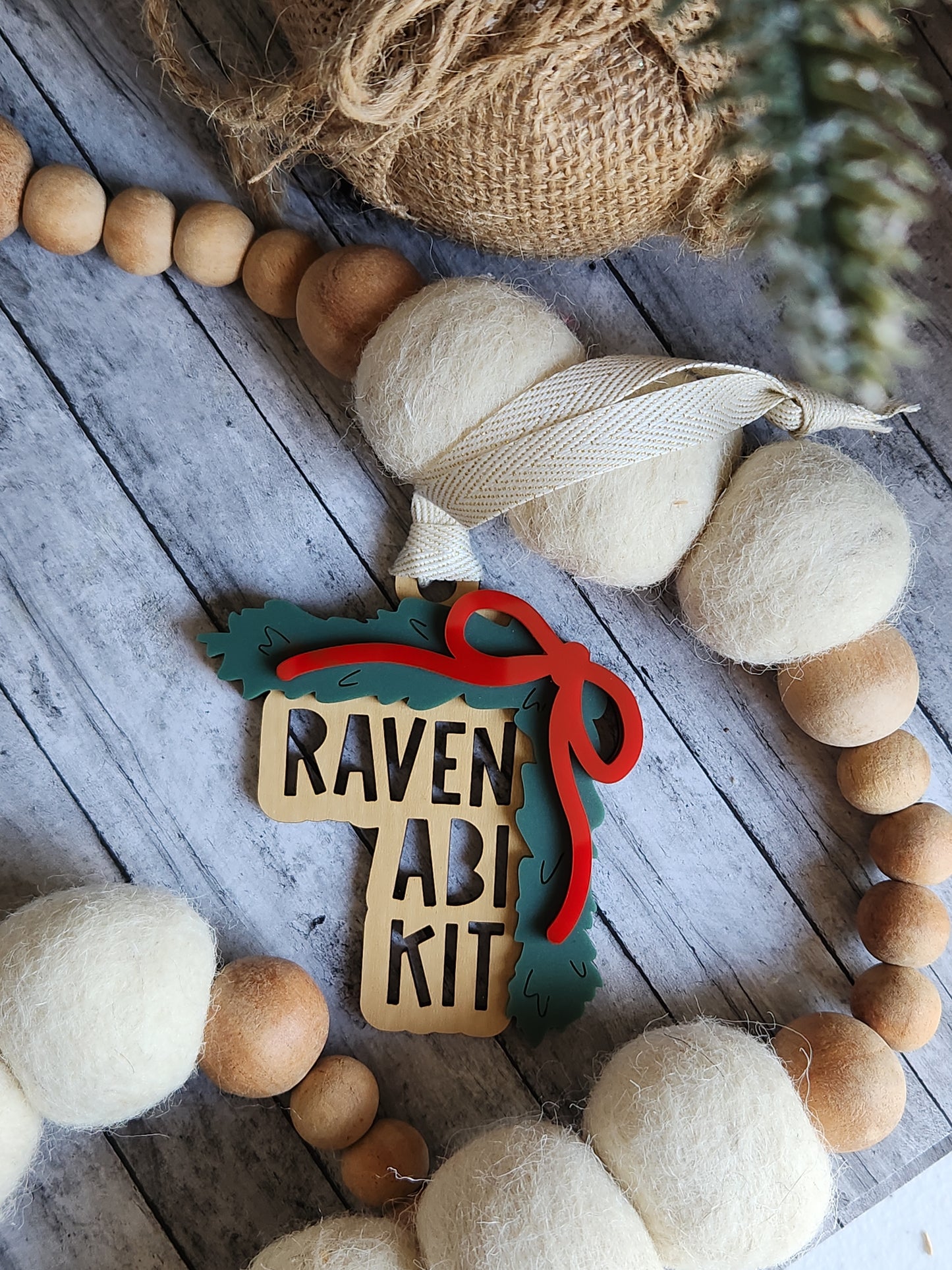 Personalized Stacked Name Ornament – Custom Family Ornament with Bow and Greenery