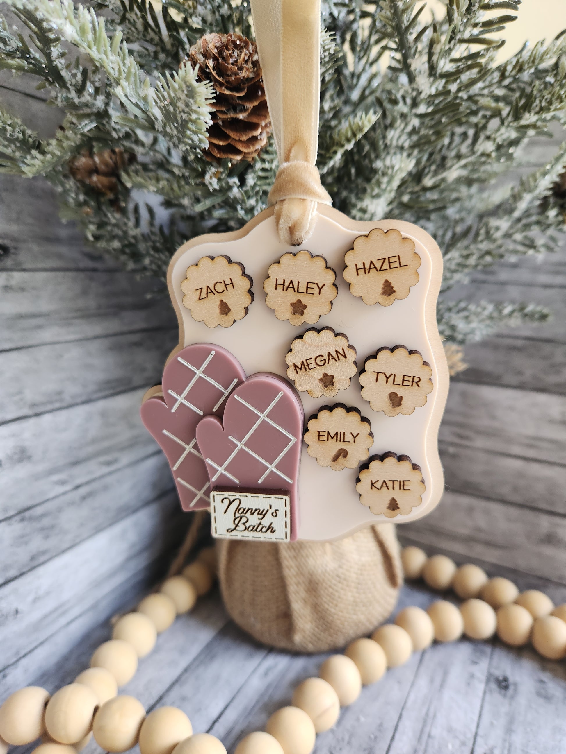 Wooden name puzzle with heart design on a rustic wooden surface with decorative elements.
