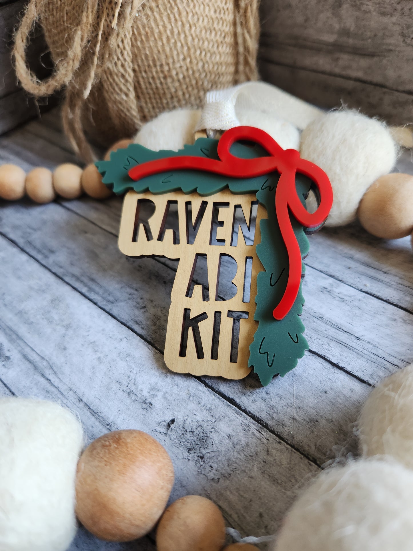 Personalized Stacked Name Ornament – Custom Family Ornament with Bow and Greenery