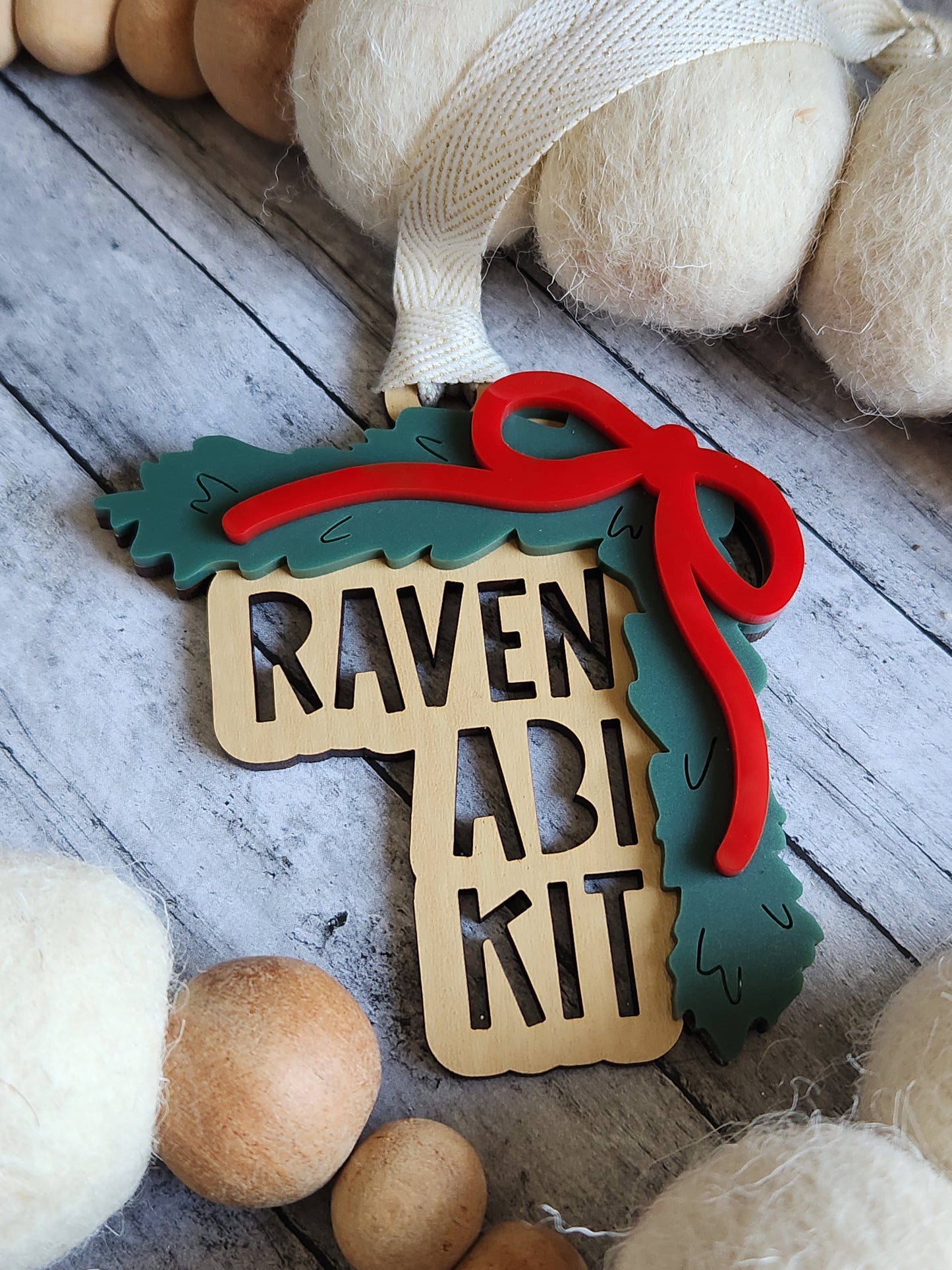 Personalized Stacked Name Ornament – Custom Family Ornament with Bow and Greenery
