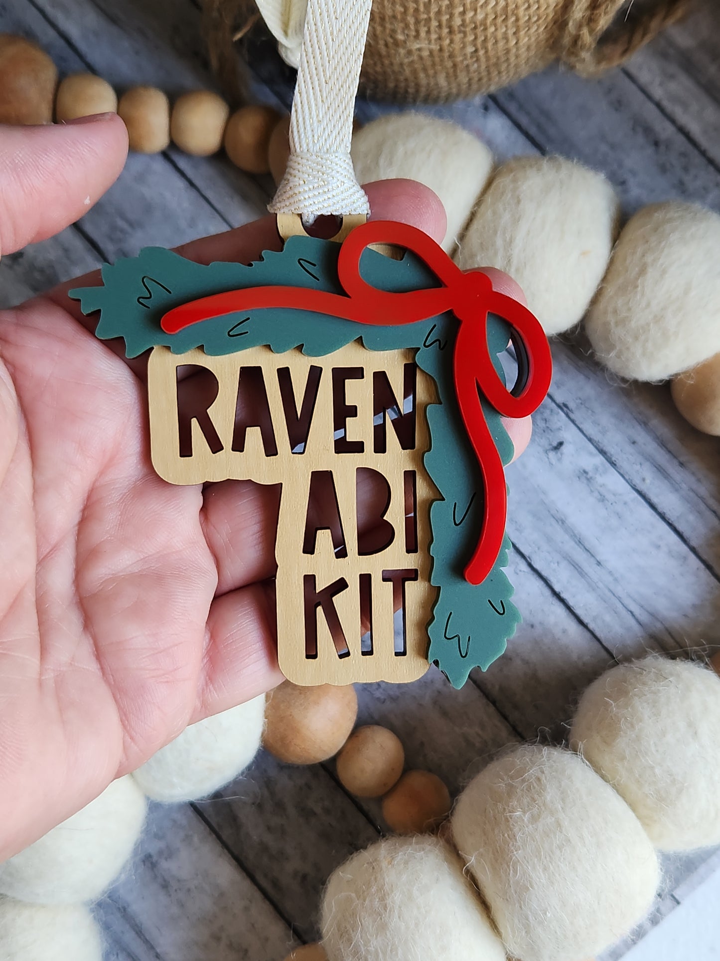 Personalized Stacked Name Ornament – Custom Family Ornament with Bow and Greenery